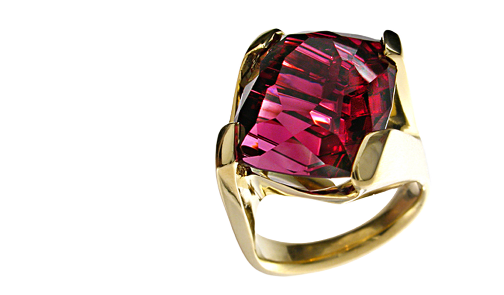“Dragon’s Fire” ladies ring - Cushion cut Rhodalite Garnet hand-cut by John Dyer, 16.64cts, set in 18k yellow gold.