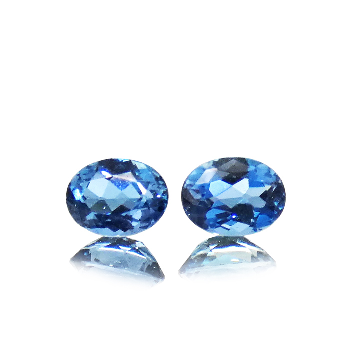 A pair of oval cut Aquamarine gemstones, 2.55ct each. Item #AQ-05.