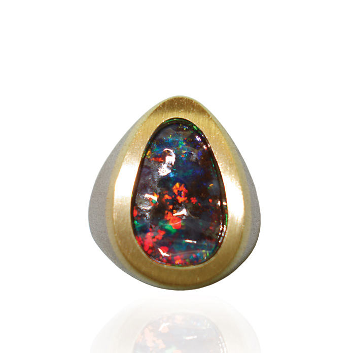 Gents ring "Framing The Universe" modified pear shaped Australian boulder opal = 7.79cts.; 18kyg/14kwg = 18.4dwt. Item #KRYW-BO-1166.