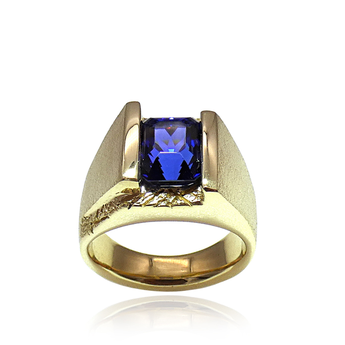 Magnificent Weave Man's Ring Item# CCJ-KRY-TZ-1221 Designer: Grace Koorey Stone Cutter/Stone: Stephen Avery; tanzanite = 6.07 cts Metal: 18KYG = 21 dwt