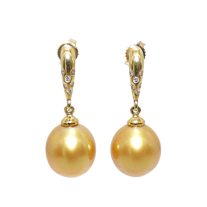 Ladies earrings with drop-shaped South Sea golden pearls = 12.1 mm and round diamonds = .12 ctw SI-1 G in 18KYG = 8.8 grams. Item# EY-SSG-D-1476