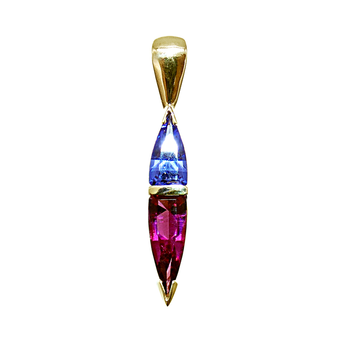 Custom Design ladie's pendant with modified triangle tanzanite = 1.06 cts and modified triangle red tourmaline = 1.56 cts in 14KYG = 4 grams. Item# KPY-TZ-RT-2462