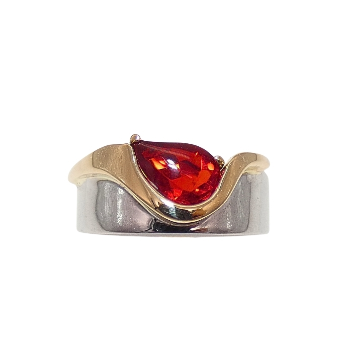 Stone: Fire Opal = 1.33 cts Setting: 14KYG/WG = 2.6 grams Item # KRYW-FO-5014 Remarks: KC custom design ladies ring with modified pear shaped, buff top, Fire Opal.